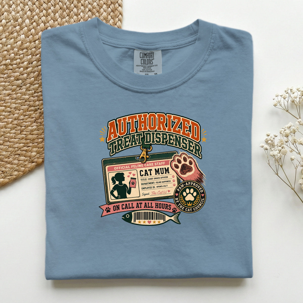 Authorized Treat Dispenser graphic tee in Blue Jean, folded mockup