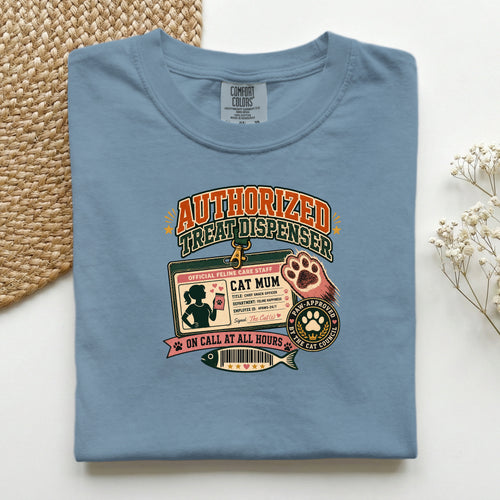 Authorized Treat Dispenser graphic tee in Blue Jean, folded mockup