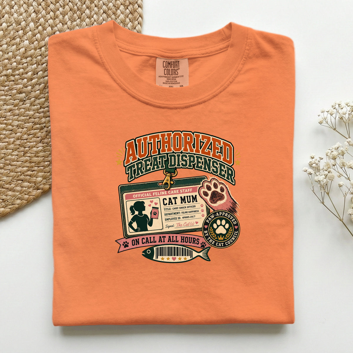 Authorized Treat Dispenser graphic tee in Burnt Orange, folded mockup