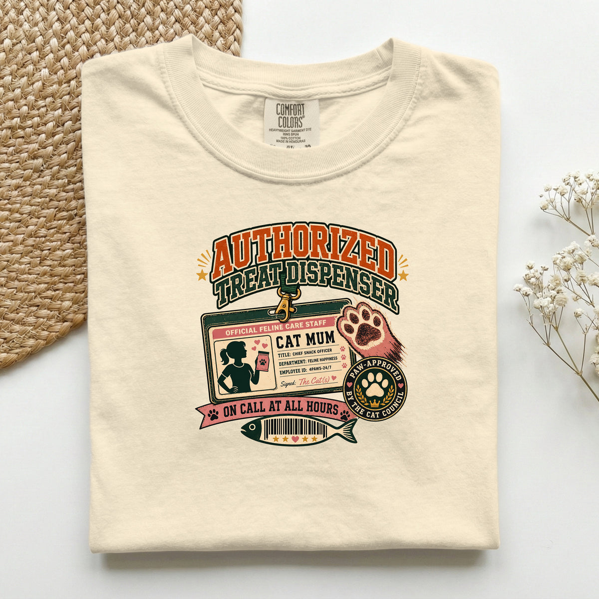 Authorized Treat Dispenser graphic tee in Ivory, folded mockup
