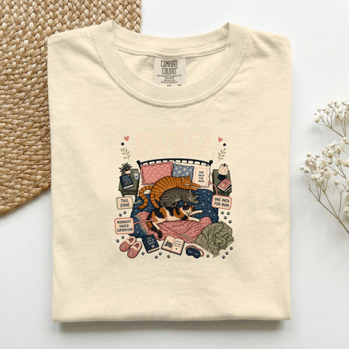 Bedtime Is A Group Project graphic tee in Ivory, folded flat lay