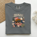 Bedtime Is A Group Project graphic tee in Pepper, folded flat lay