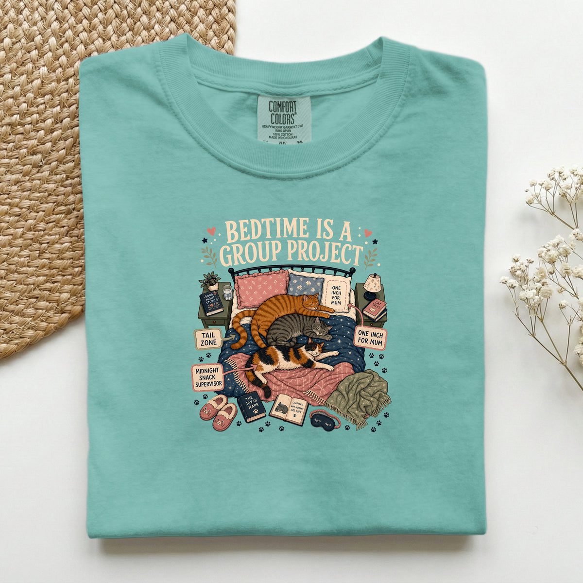 Bedtime Is A Group Project graphic tee in Seafoam, folded flat lay