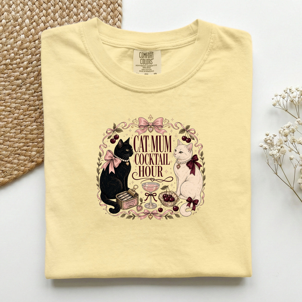 Cat Mum Cocktail Hour graphic tee in Butter, folded flat lay