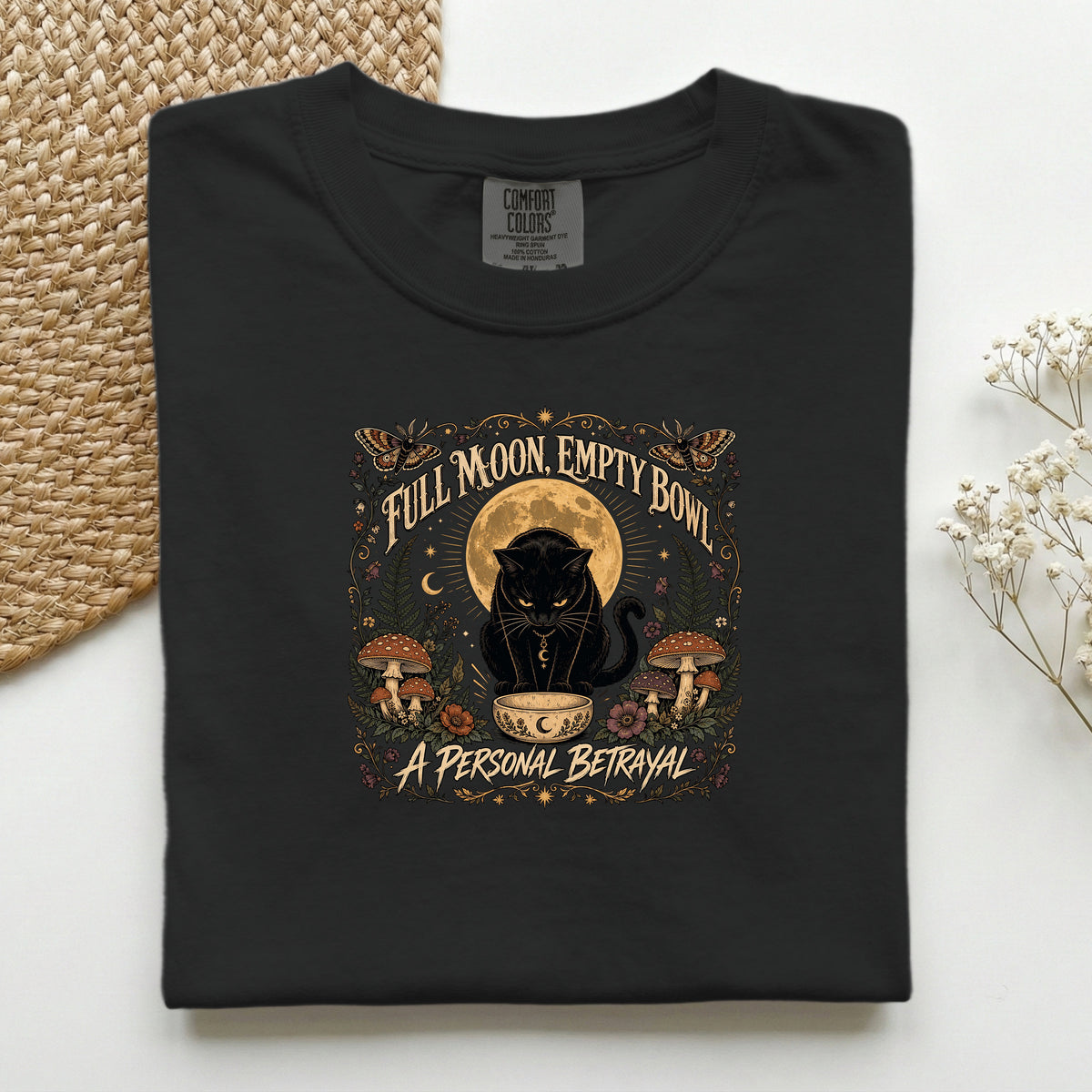 Full Moon Empty Bowl graphic tee in Black, folded flat lay