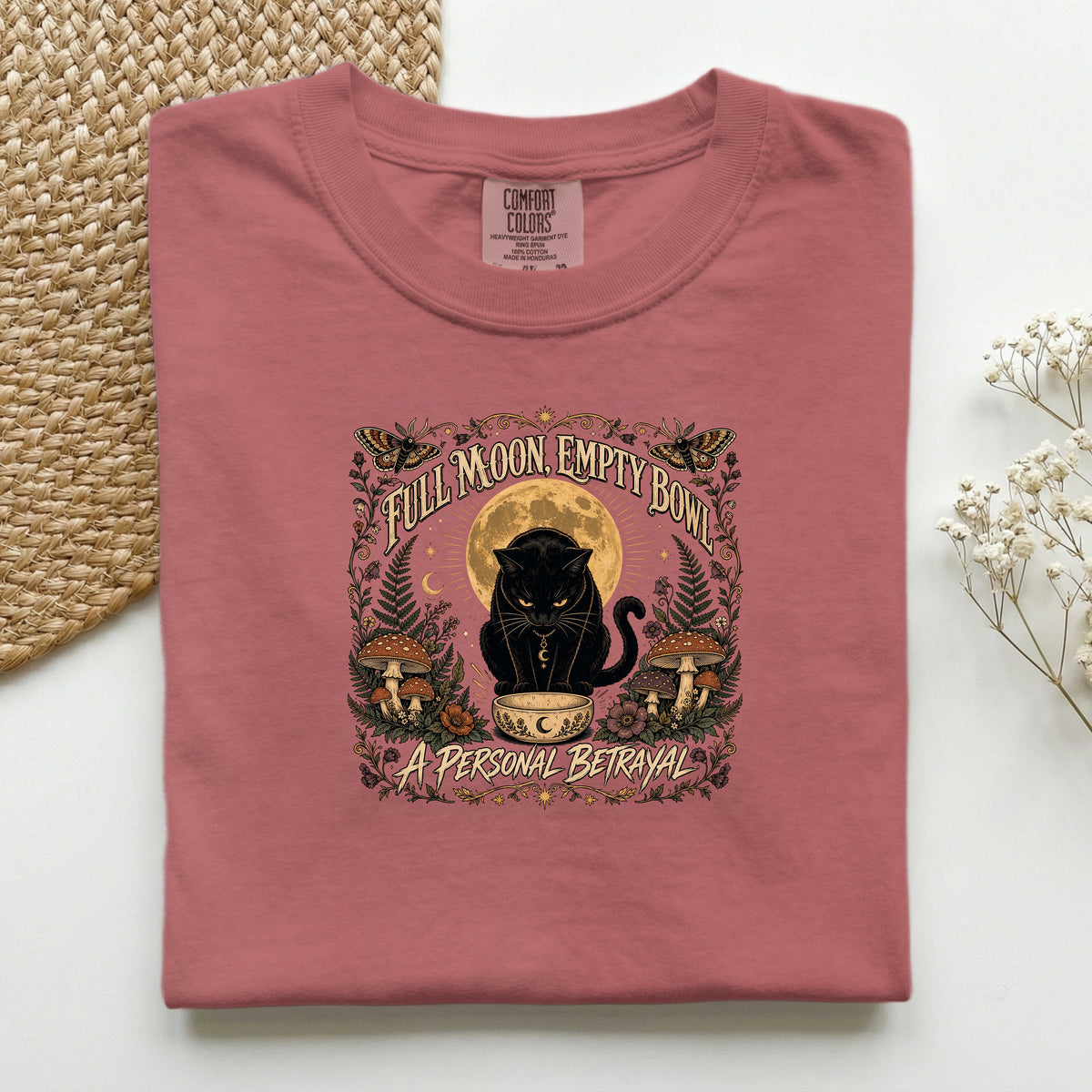 Full Moon Empty Bowl graphic tee in Crimson, folded flat lay