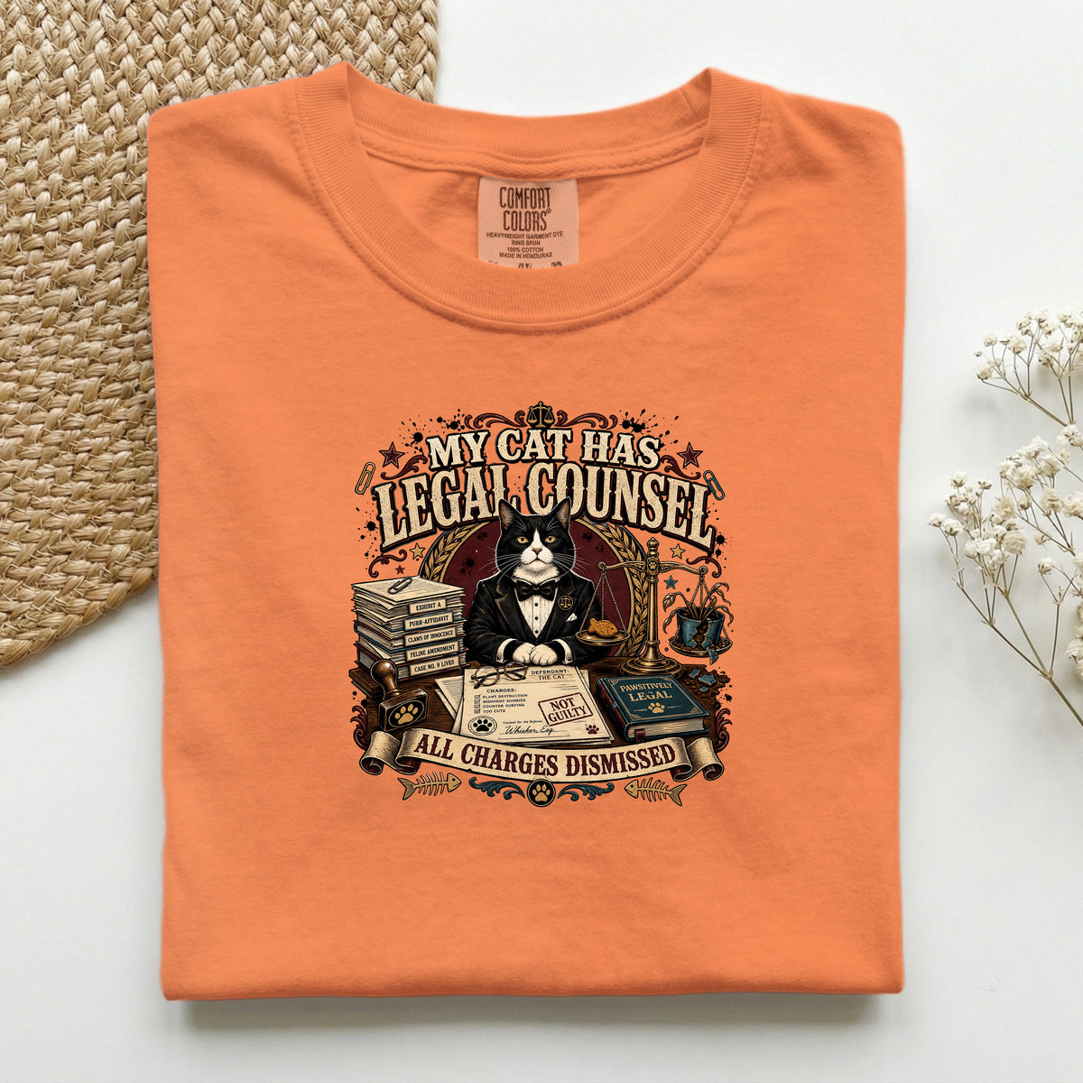 My Cat Has Legal Counsel graphic tee in Burnt Orange, folded mockup
