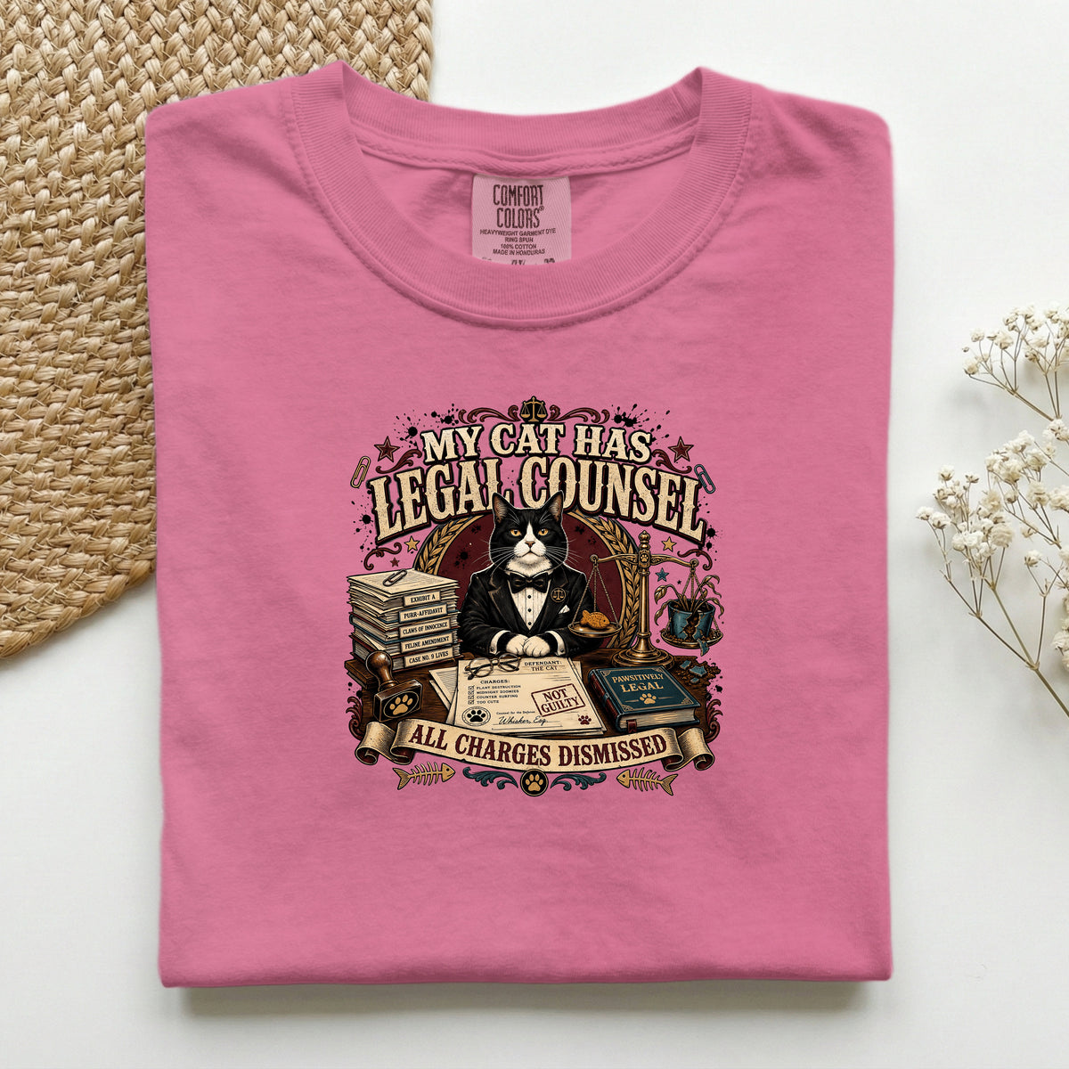 My Cat Has Legal Counsel graphic tee in Crunchberry, folded mockup