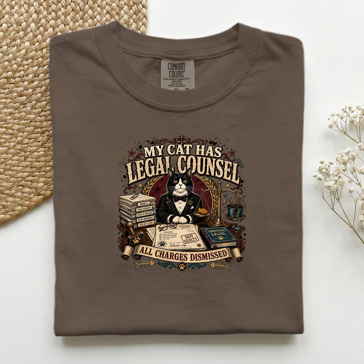 My Cat Has Legal Counsel graphic tee in Espresso, folded mockup