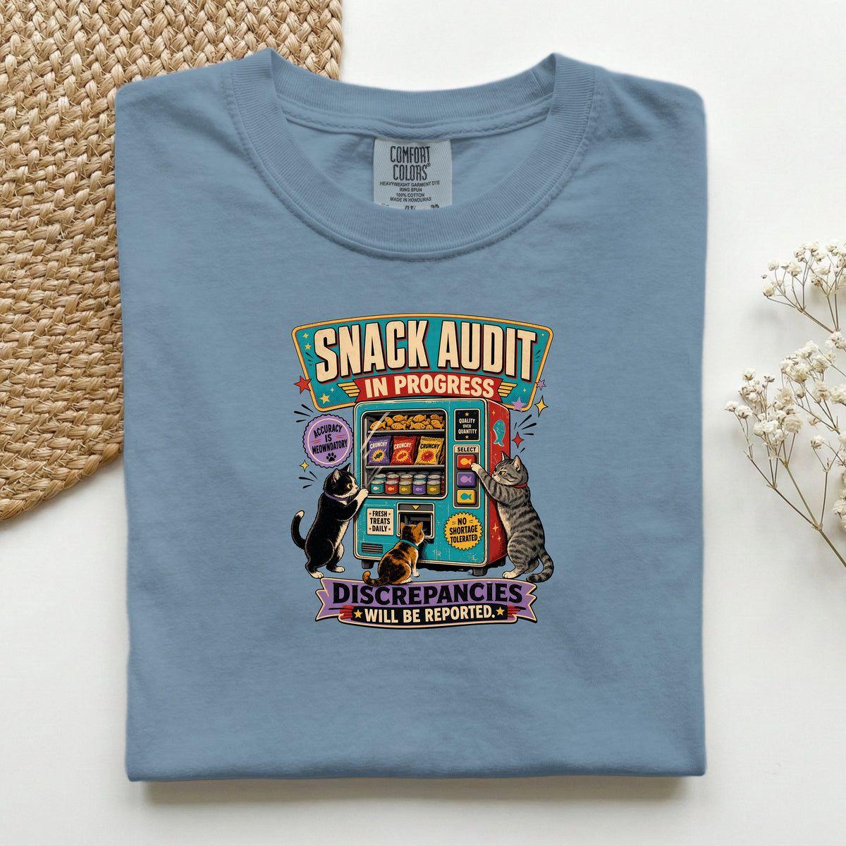 Snack Audit In Progress graphic tee in Blue Jean, folded mockup
