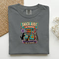 Snack Audit In Progress graphic tee in Pepper, folded mockup