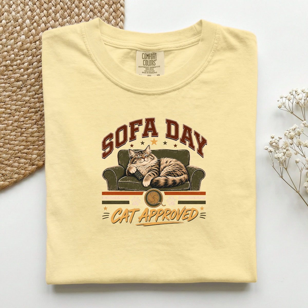 Sofa Day Cat Approved graphic tee in Butter, folded flat lay