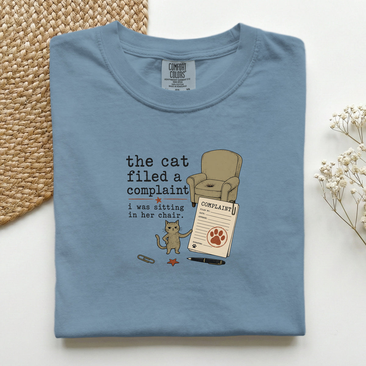 The Cat Filed A Complaint graphic tee in Blue Jean, folded mockup