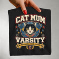 Cat Mum Varsity graphic tee in Black, folded flat lay
