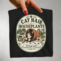 Cat Hair & Houseplants graphic tee in Black, folded flat lay
