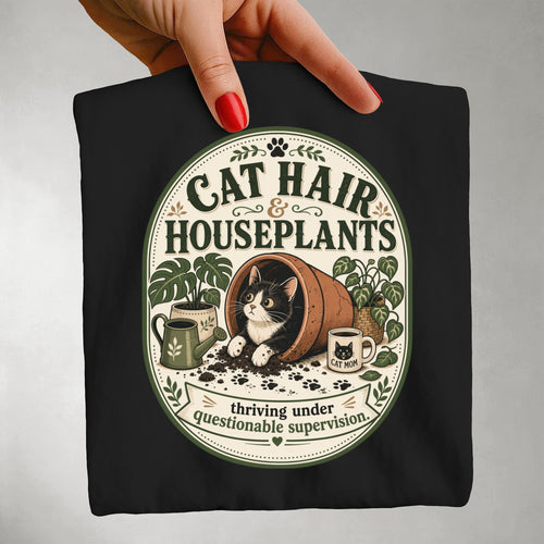 Cat Hair & Houseplants graphic tee in Black, folded flat lay