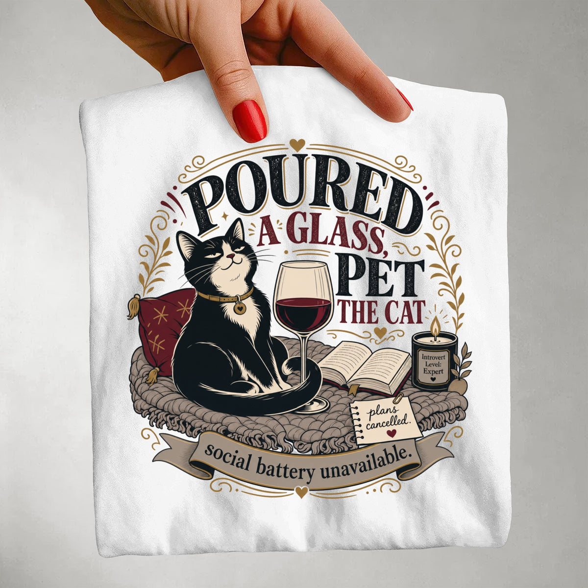 Poured a Glass Pet the Cat graphic tee in White, close-up of print detail held by hand