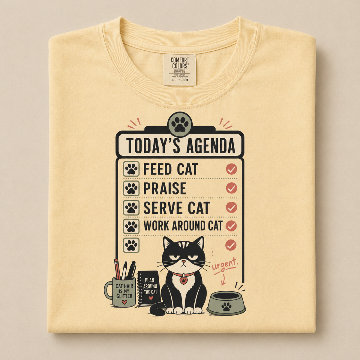 Today's Agenda Feed Cat graphic tee in Butter, folded flat lay