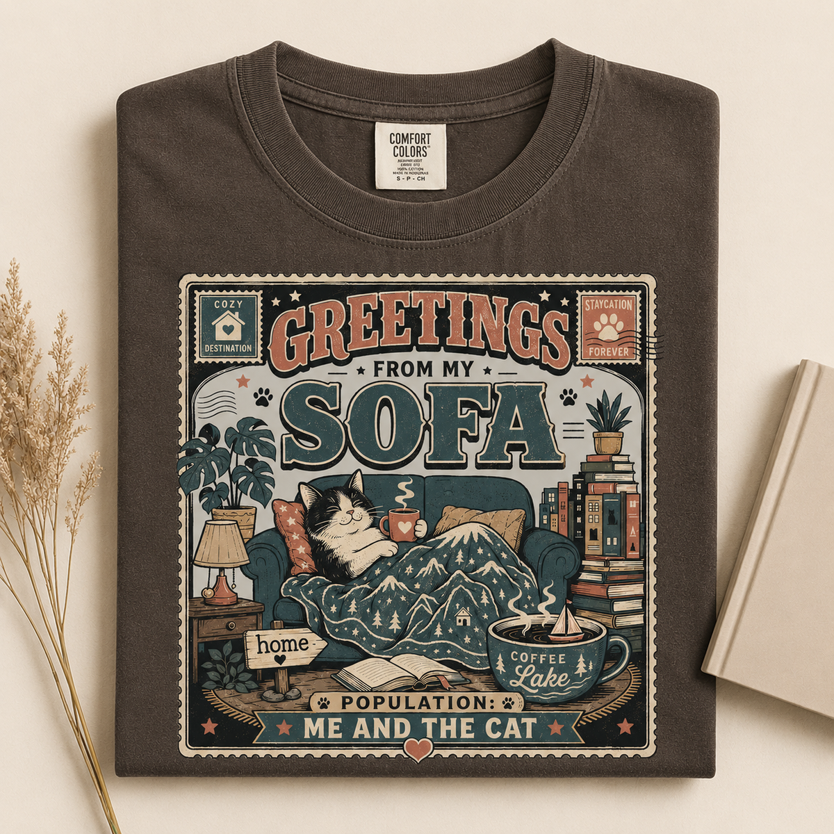 Greetings From My Sofa graphic tee in Espresso, folded flat lay