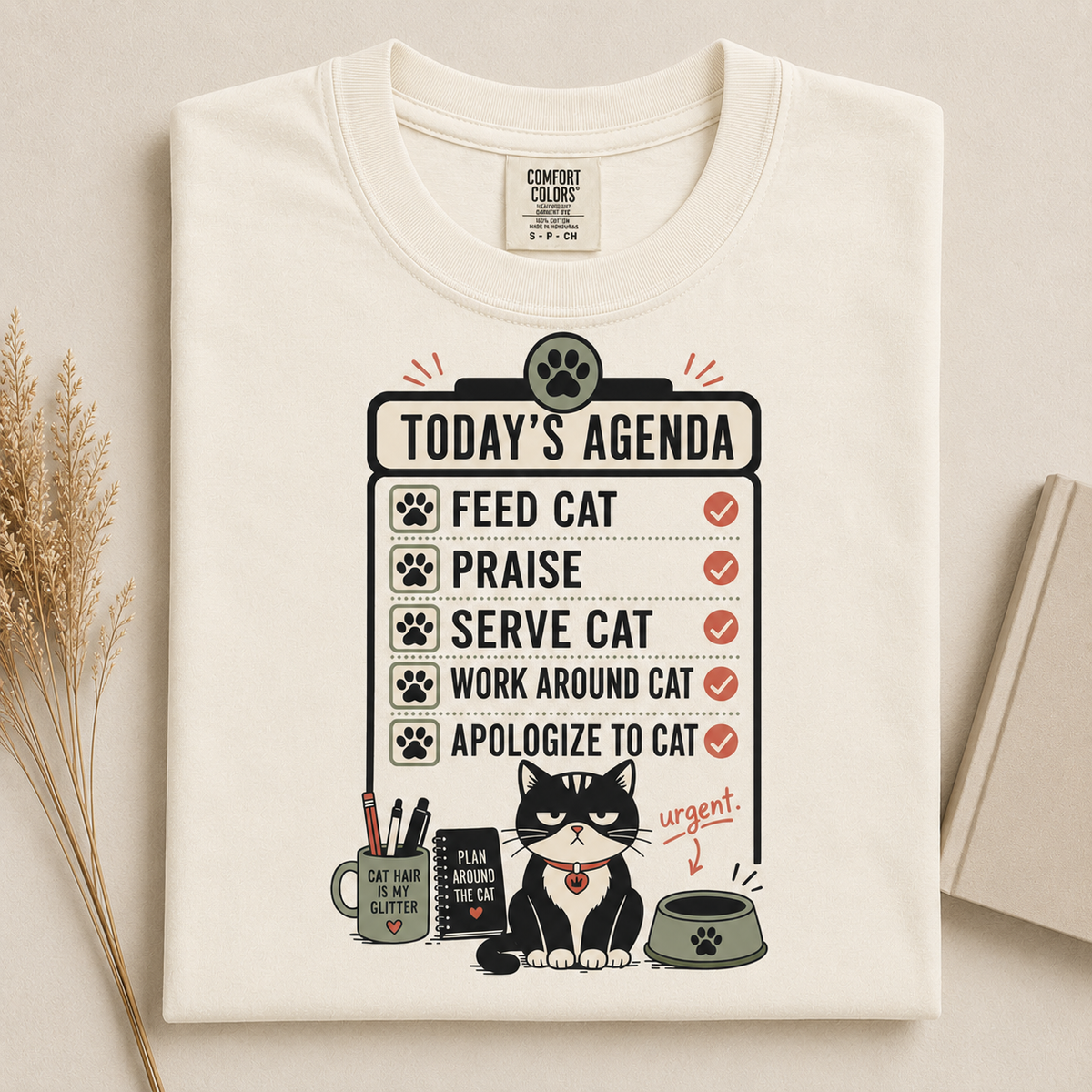 Today's Agenda Feed Cat graphic tee in Ivory, folded flat lay