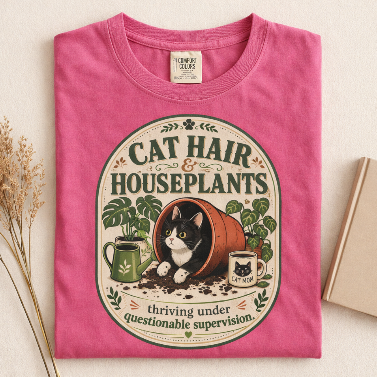 Cat Hair & Houseplants graphic tee in Crunchberry, folded flat lay