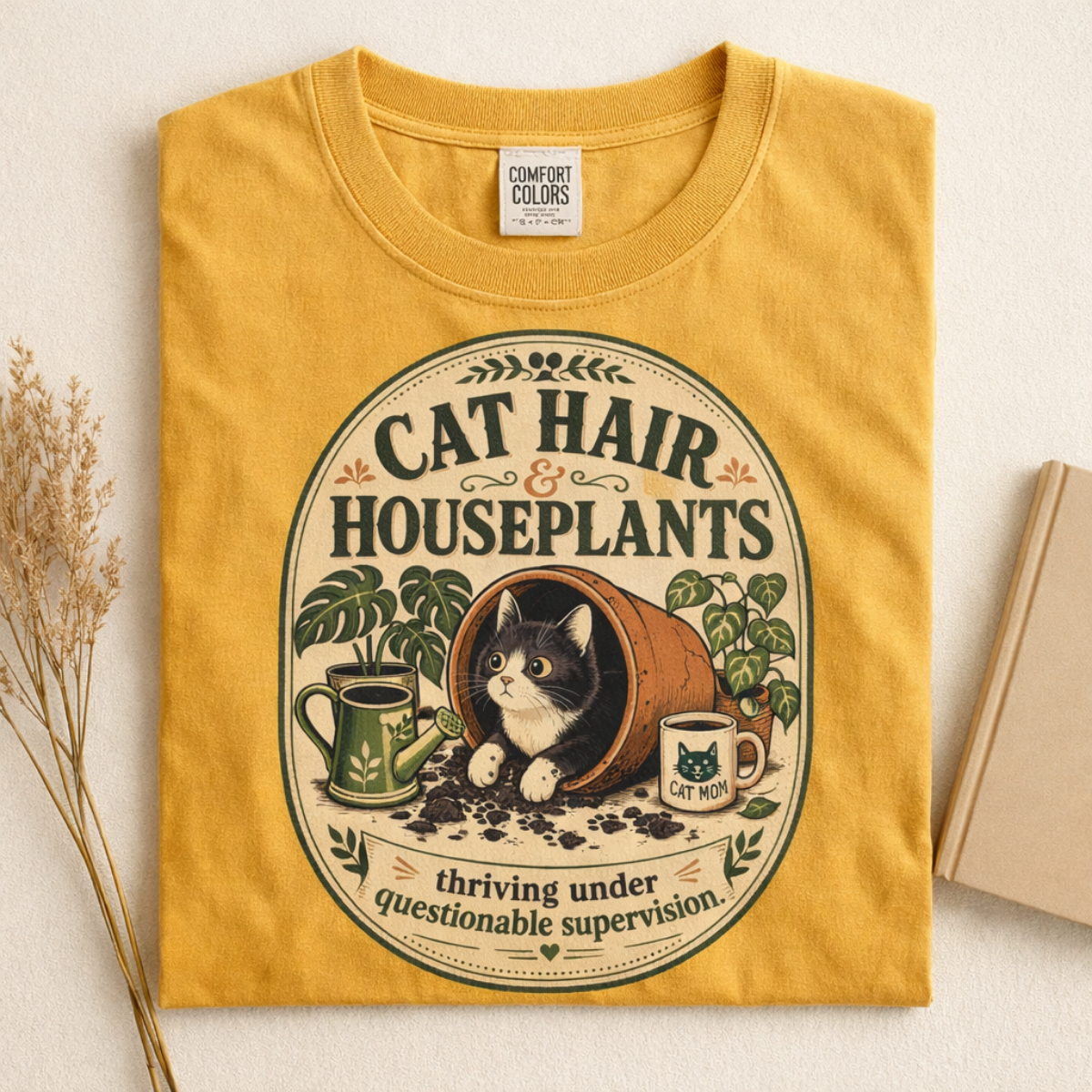 Cat Hair & Houseplants graphic tee in Mustard, folded flat lay