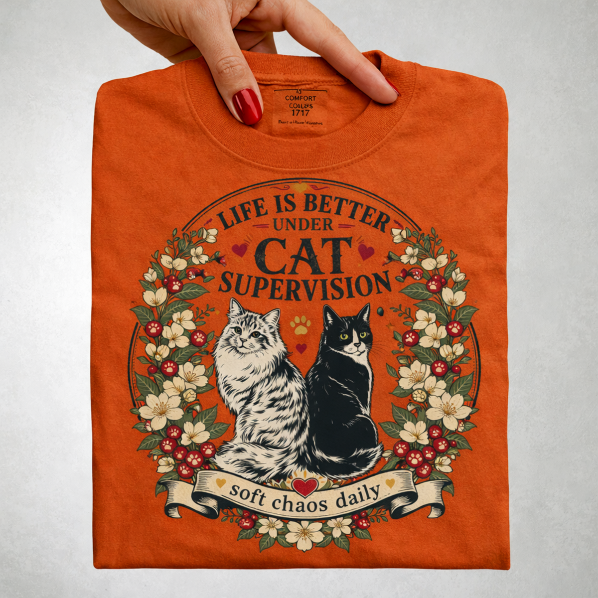 Life Is Better Under Cat Supervision graphic tee in Burnt Orange, folded flat lay