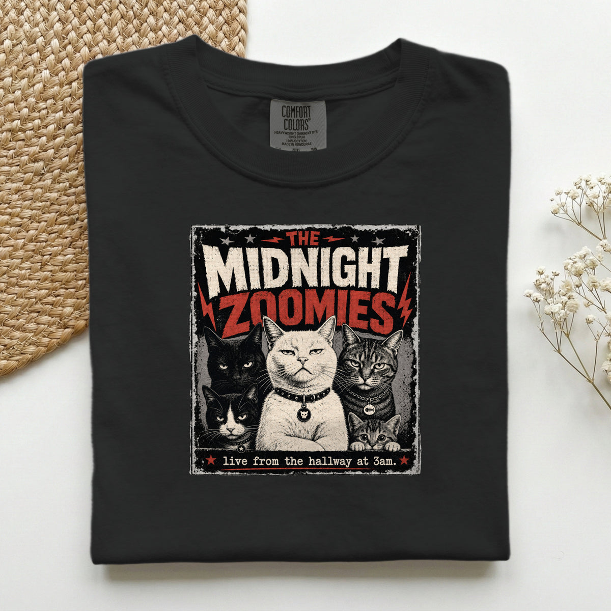 The Midnight Zoomies graphic tee in Black, folded flat lay