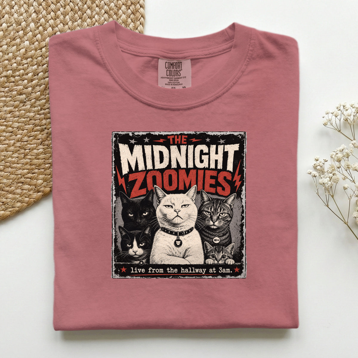 The Midnight Zoomies graphic tee in Crunchberry, folded flat lay
