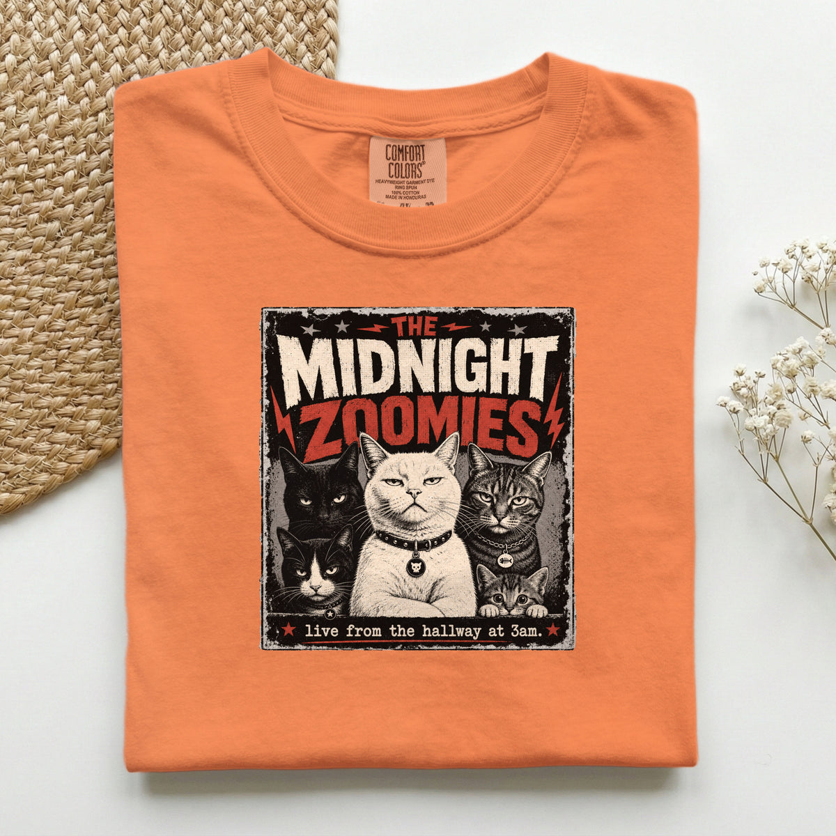 The Midnight Zoomies graphic tee in Blue Jean, folded flat lay