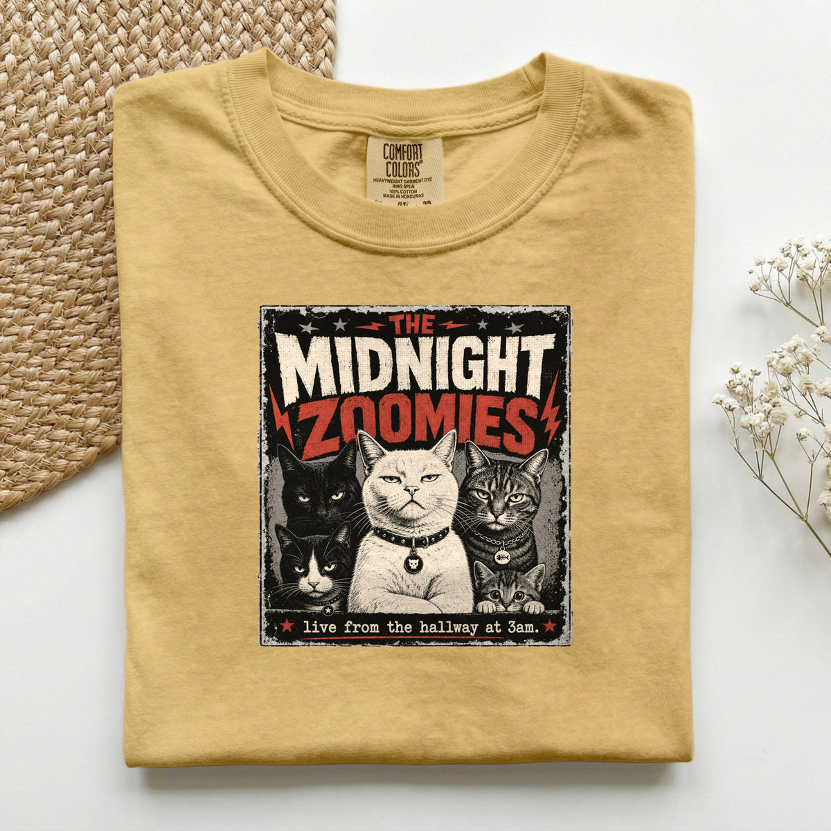 The Midnight Zoomies graphic tee in Mustard, folded flat lay