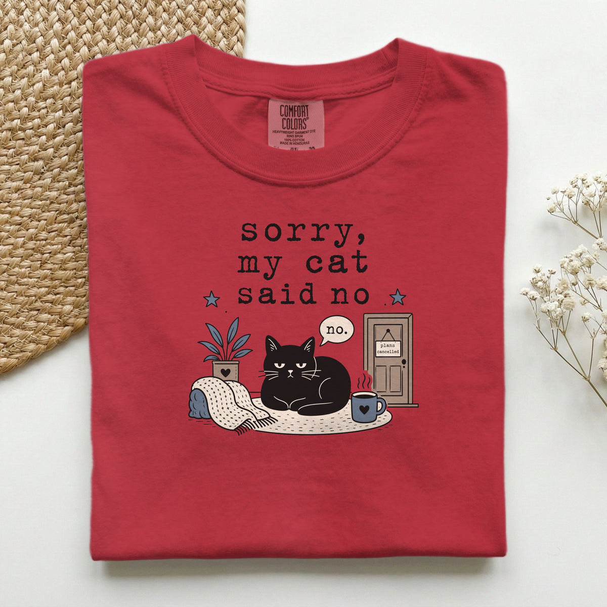 Sorry My Cat Said No graphic tee in Mustard, folded flat lay
