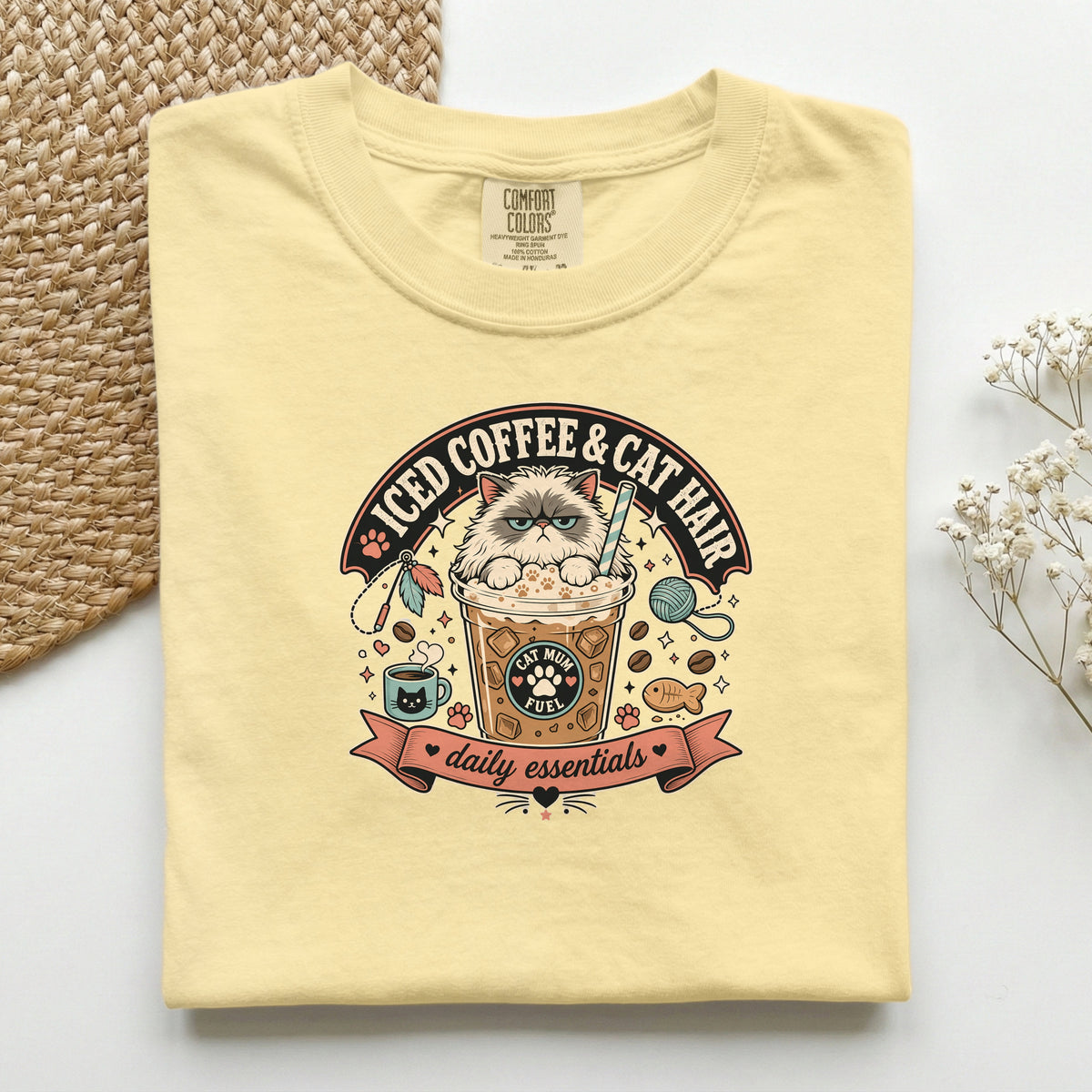 Iced Coffee & Cat Hair graphic tee in Butter, folded flat lay