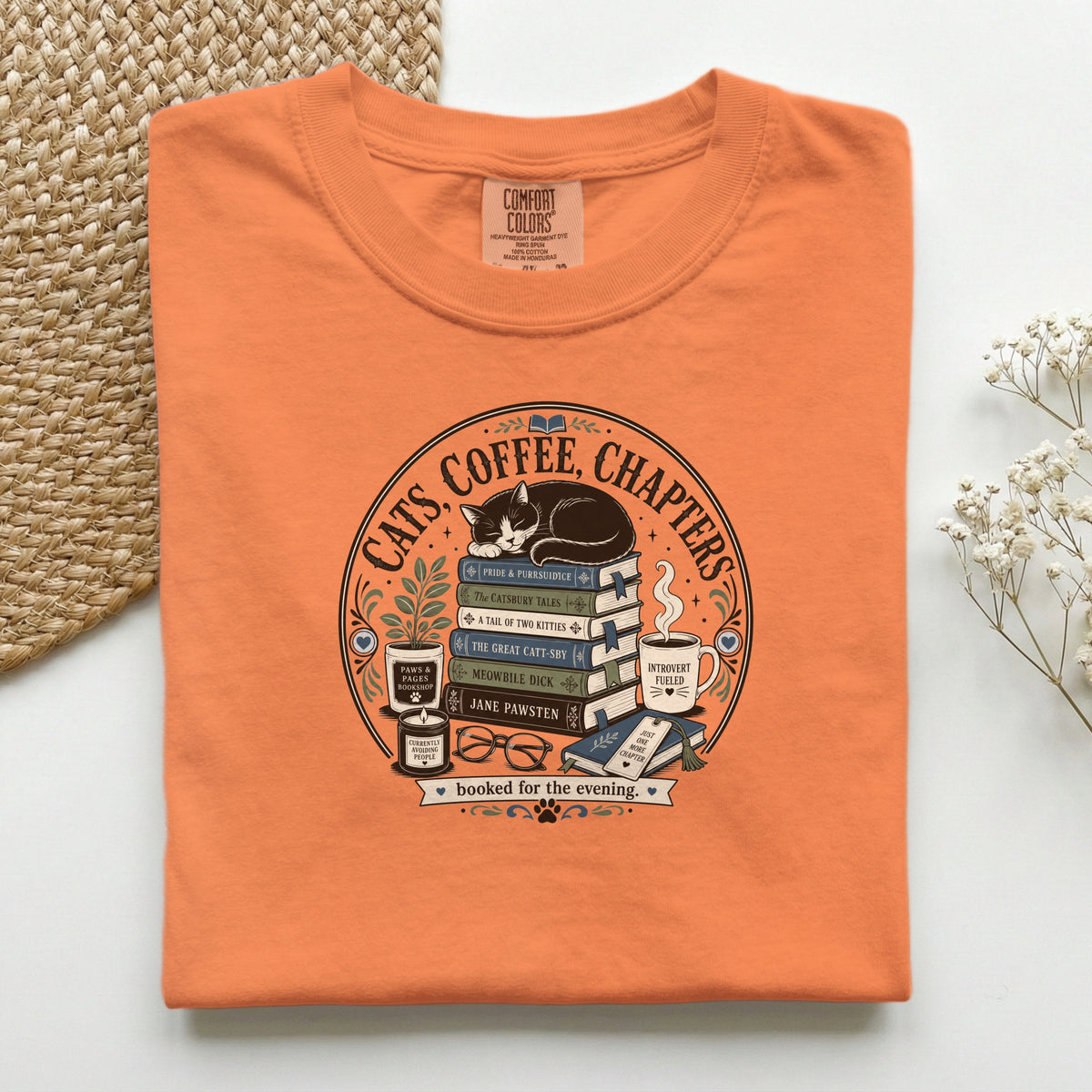Cats Coffee Chapters graphic tee in Ivory, folded flat lay