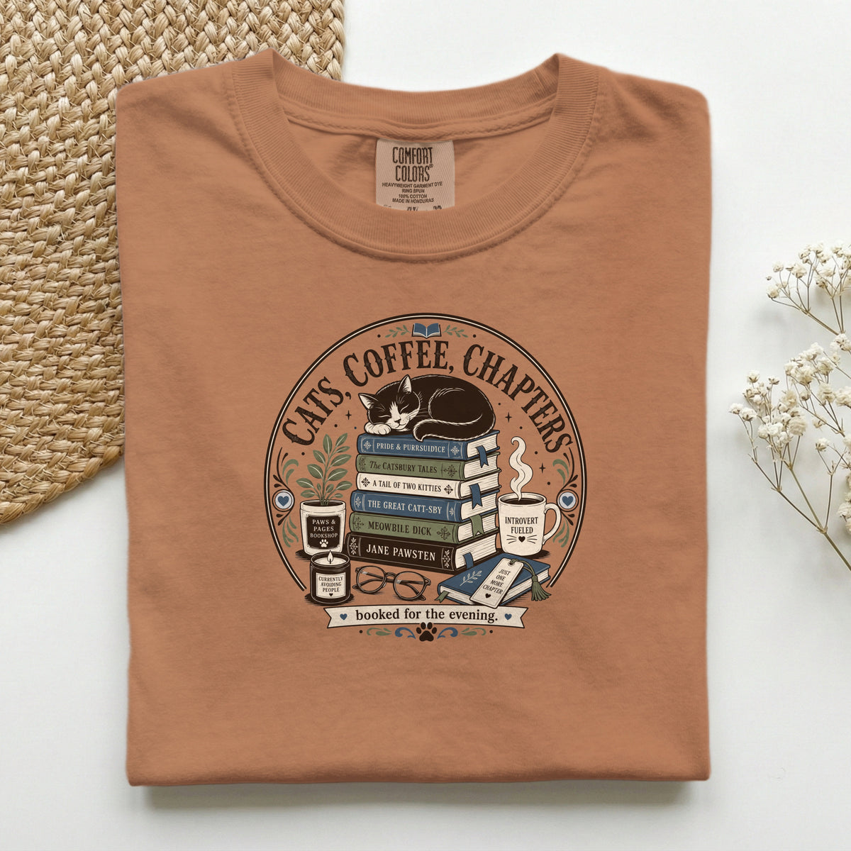 Cats Coffee Chapters graphic tee in Yam, folded flat lay