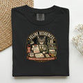 Feline Resources graphic tee in Black, folded flat lay