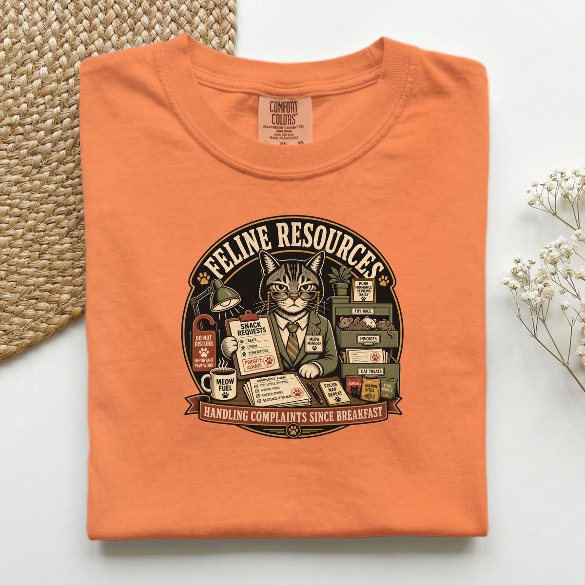 Feline Resources graphic tee in Red, folded flat lay