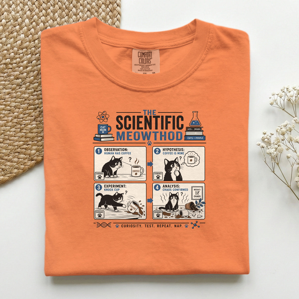 Scientific Meowthod graphic tee in Crunchberry, folded flat lay