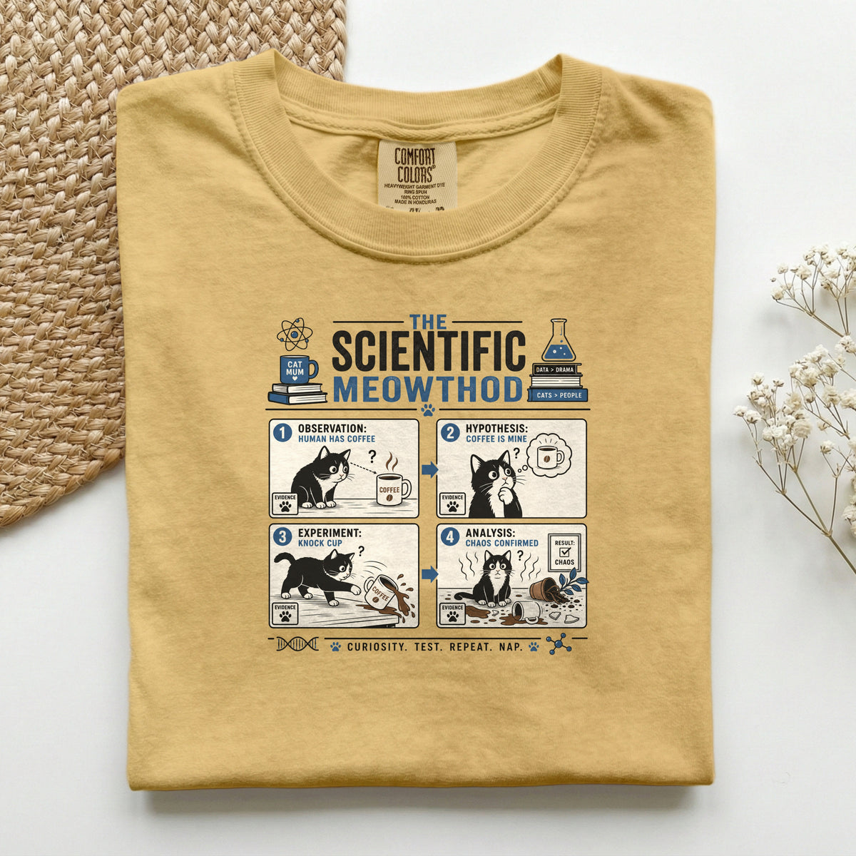 Scientific Meowthod graphic tee in Burnt Orange, folded flat lay