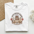 Kitty Biscuits Bakery graphic tee in White, folded flat lay