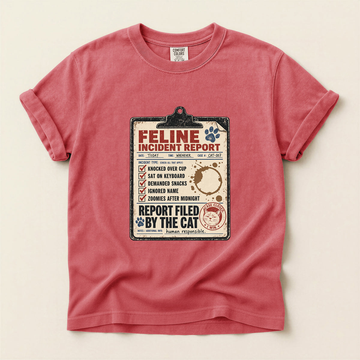 Feline Incident Report graphic tee in Pepper, folded flat lay
