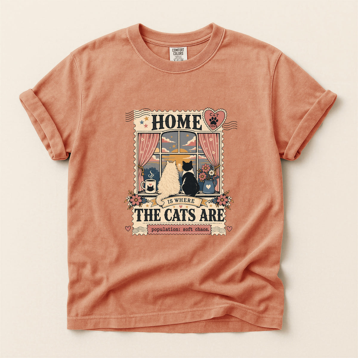 Home Is Where The Cats Are graphic tee in Terracotta, folded flat lay