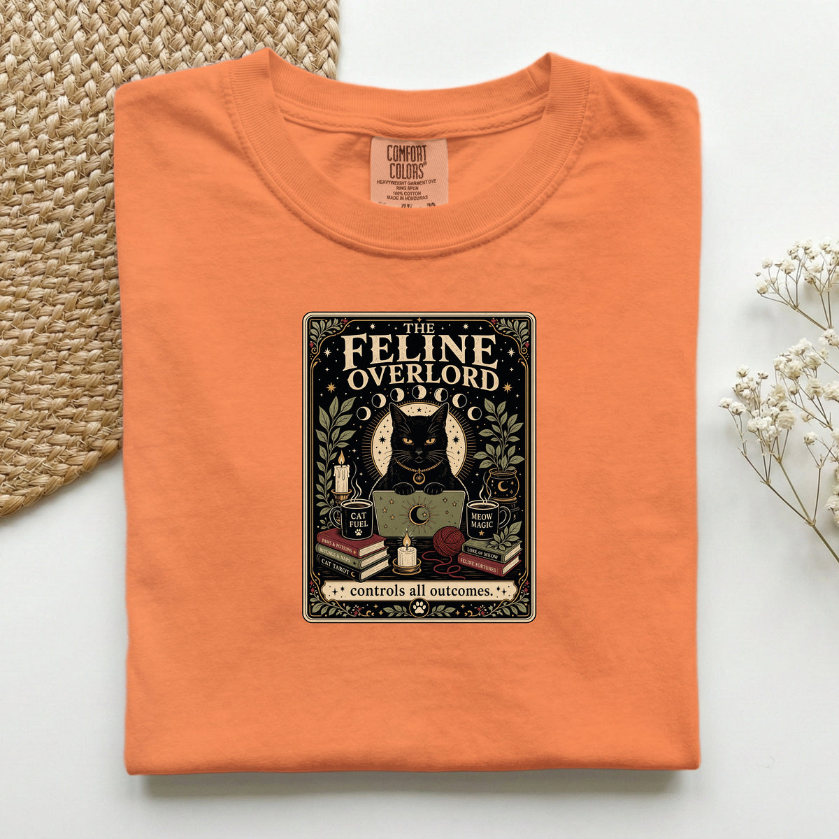 The Feline Overlord graphic tee in Mustard, folded flat lay