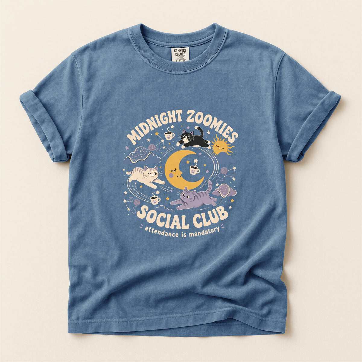 Midnight Zoomies Social Club graphic tee in Blue Jean, folded flat lay