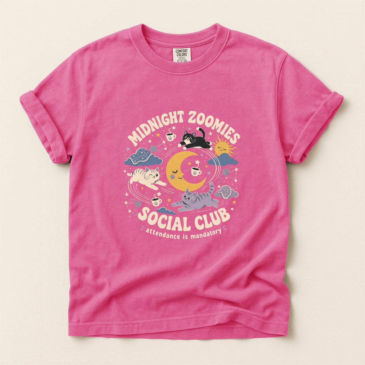 Midnight Zoomies Social Club graphic tee in Crunchberry, folded flat lay