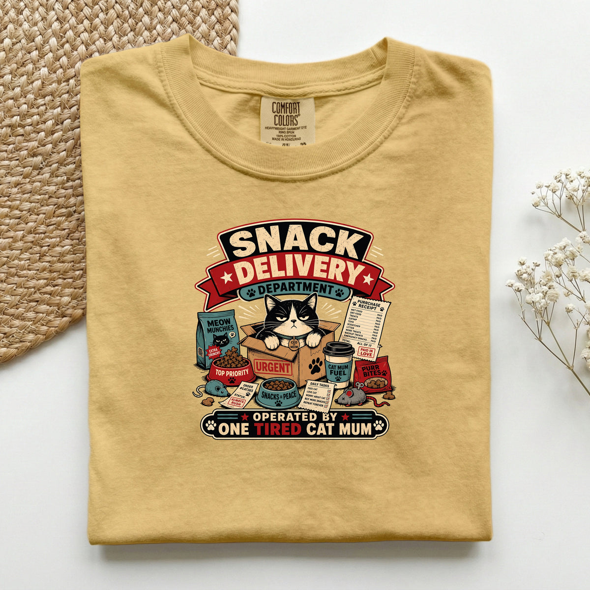 Snack Delivery Department graphic tee in Mustard, folded flat lay