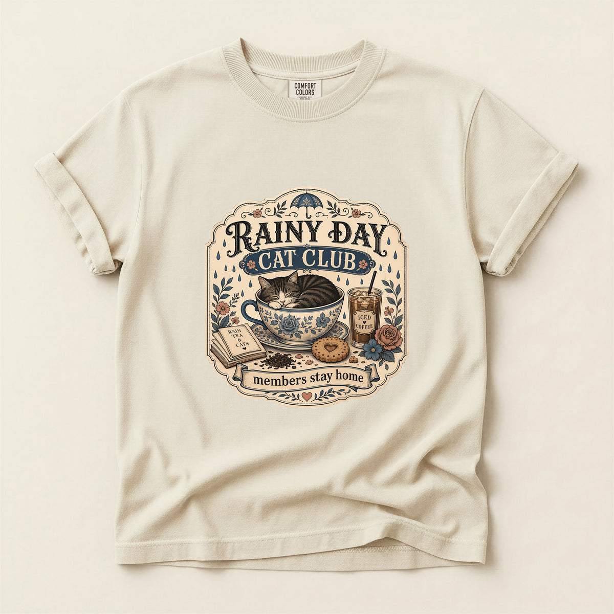 Rainy Day Cat Club graphic tee in Ivory, folded flat lay