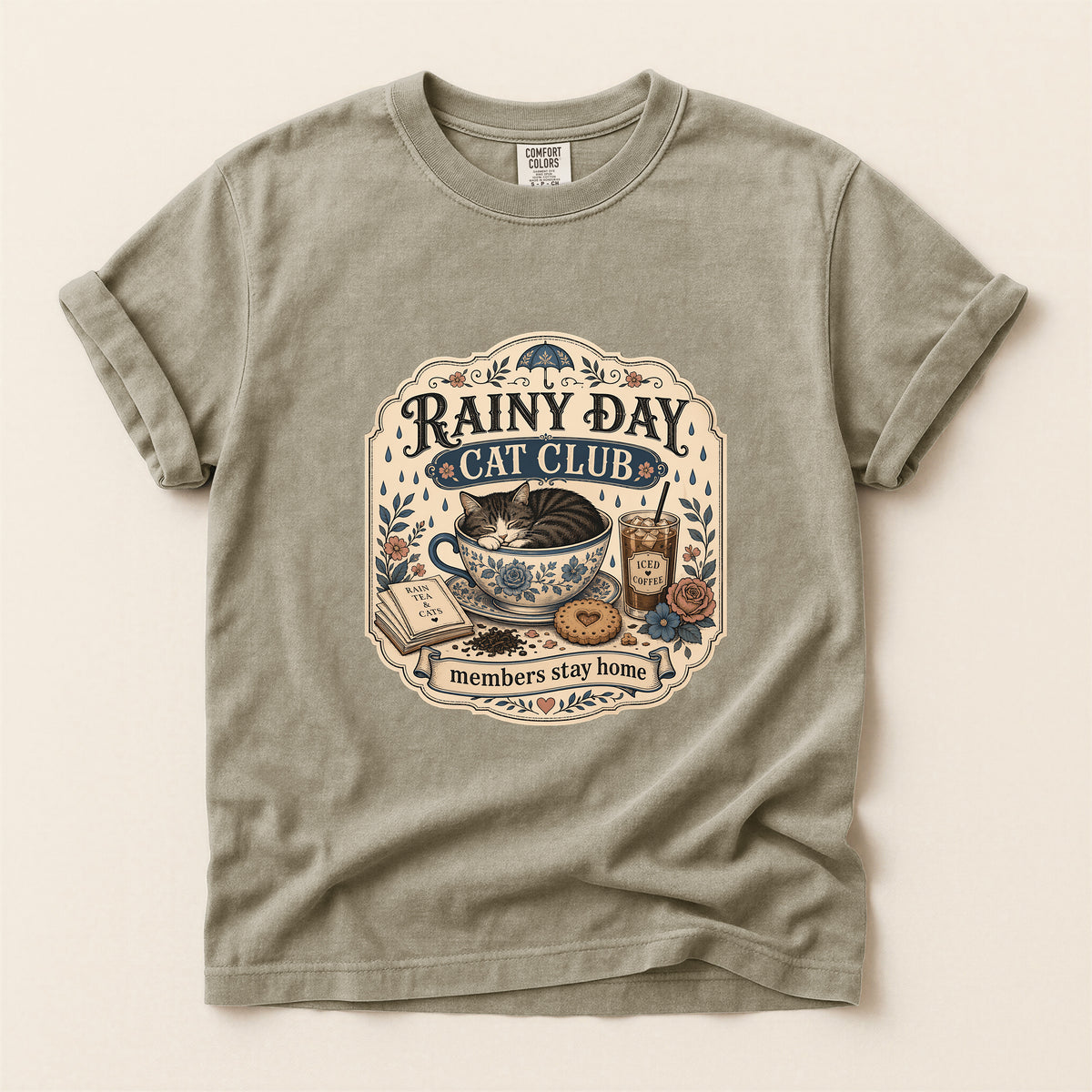 Rainy Day Cat Club graphic tee in Khaki, folded flat lay