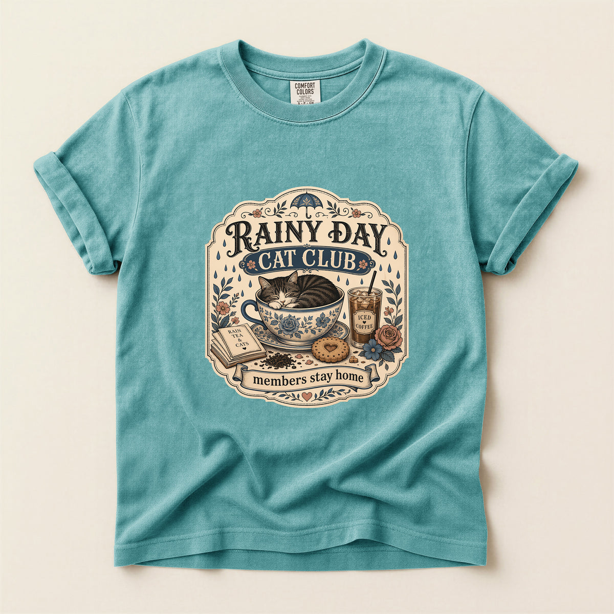 Rainy Day Cat Club graphic tee in Seafoam, folded flat lay