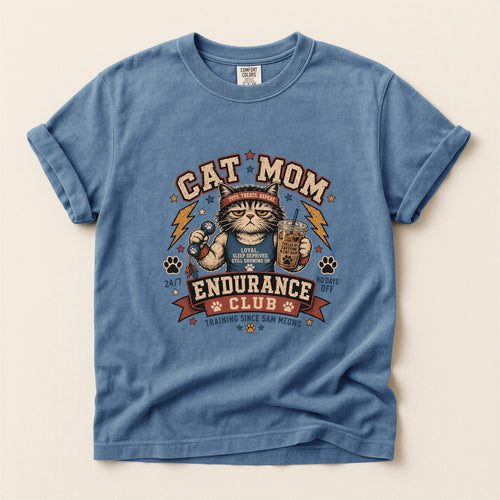 Cat Mom Endurance Club graphic tee in Blue Jean, folded flat lay